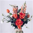 A vase of gorgeous country garden flowers